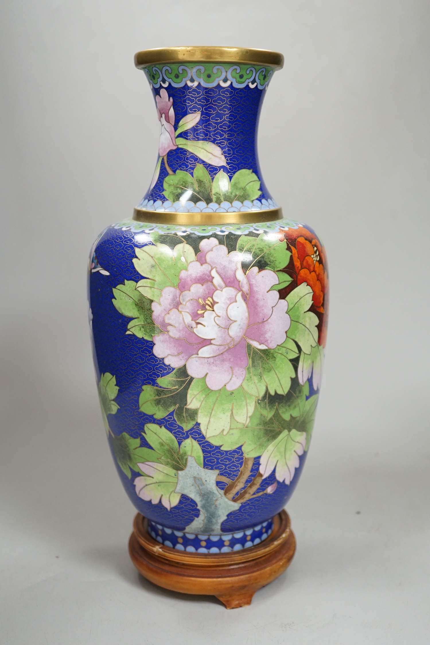 A Chinese cloisonné enamel vase on stand, 35cm high including stand